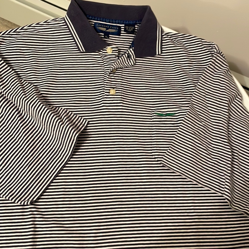Raymond Floyd Short sleeve shirt. Men’s size XL. New condition.